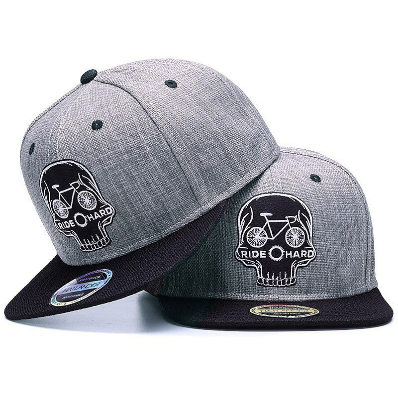 Ride Hard Skull baseball cap with bike print, edgy snapback hat, perfect for biker style enthusiasts.
