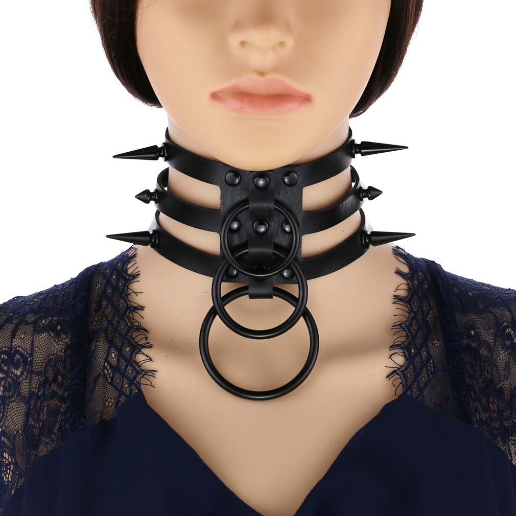 Rivet leather spiked choker necklace with metal rings, perfect for alternative fashion and punk style.
