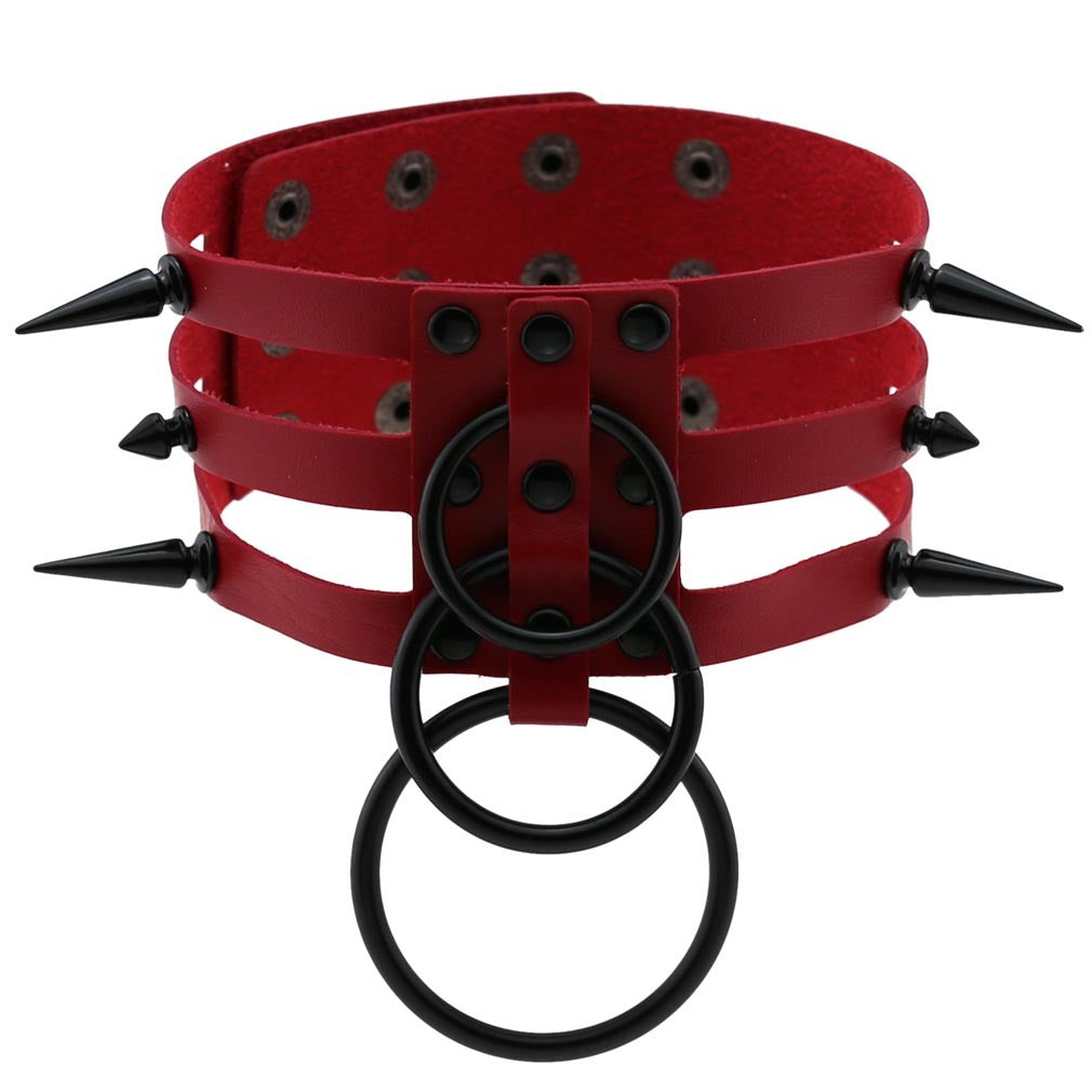 Rivet leather spiked choker with black metal rings, perfect for alternative fashion and rock concert outfits.