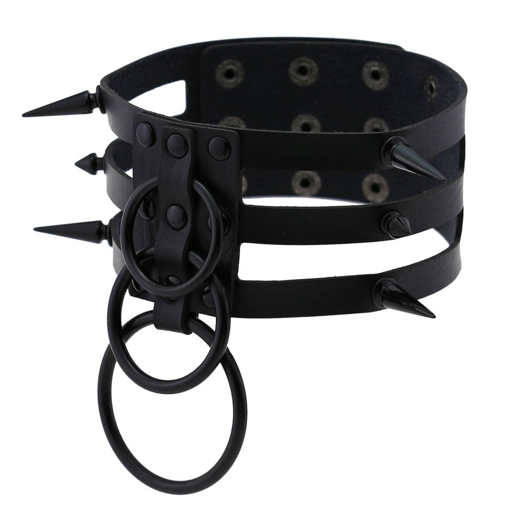 Rivet leather spiked choker with metal rings, perfect for punk and alternative fashion styles.