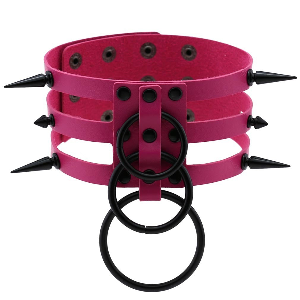 Rivet leather spiked choker in pink with metal rings, perfect for alternative fashion and punk outfits.