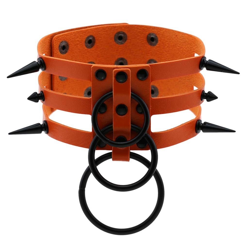 Rivet leather spiked choker with metal rings, perfect for punk fashion and rock concerts, showcasing bold style.
