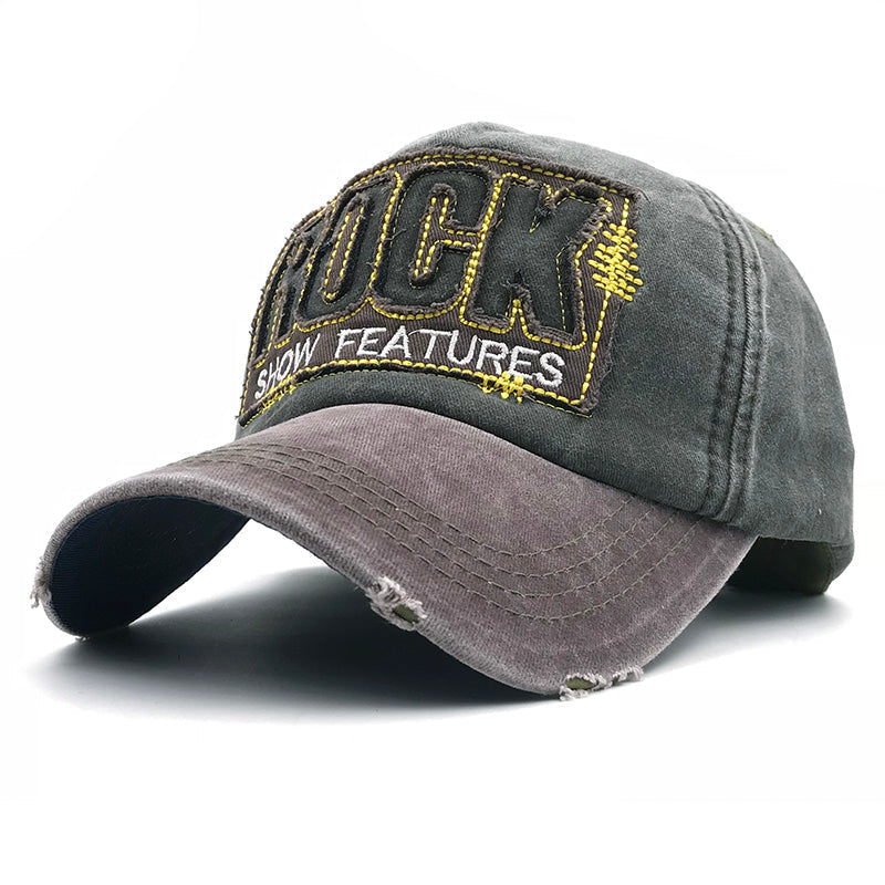 Stylish gray baseball cap with yellow ROCK embroidery, perfect for rock and metal fashion enthusiasts. Unisex snapback design.