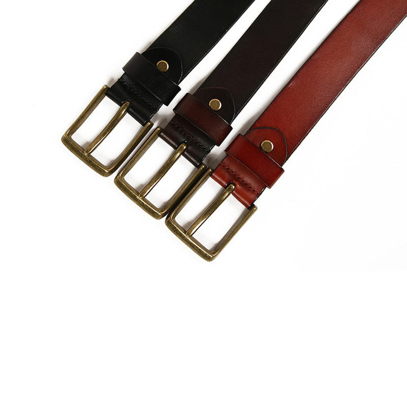 Rock belts with riveted decorative buckles in black, brown, and red for stylish alternative fashion.