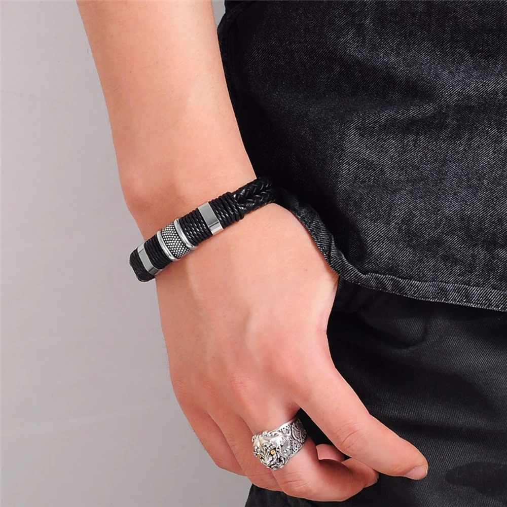 Rock Braid Leather Bracelet worn on wrist, showcasing casual style and stainless steel elements.
