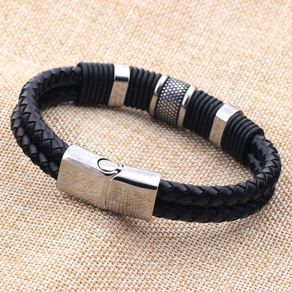 Rock braid leather bracelet with stainless steel clasp and vintage bangle design, perfect for casual wear.