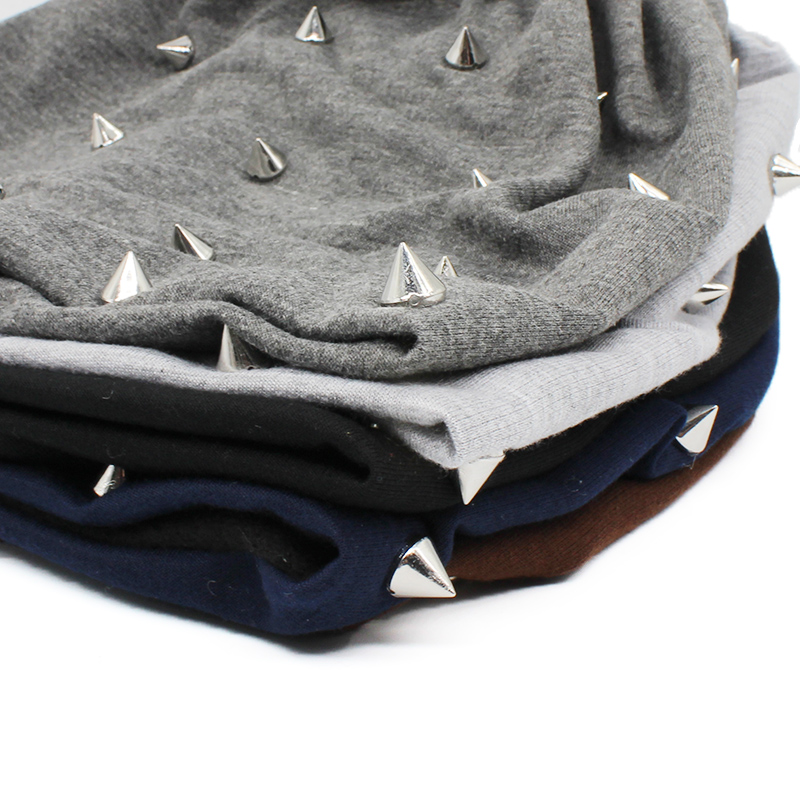 Stack of unisex rock-style spiked hats in gray, navy, black, and brown, showcasing unique spiked design for alternative fashion.