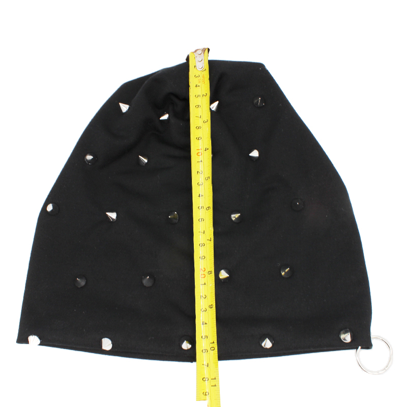 Black spiked beanie hat with measuring tape, showcasing rock and metal style in unisex adult fashion.