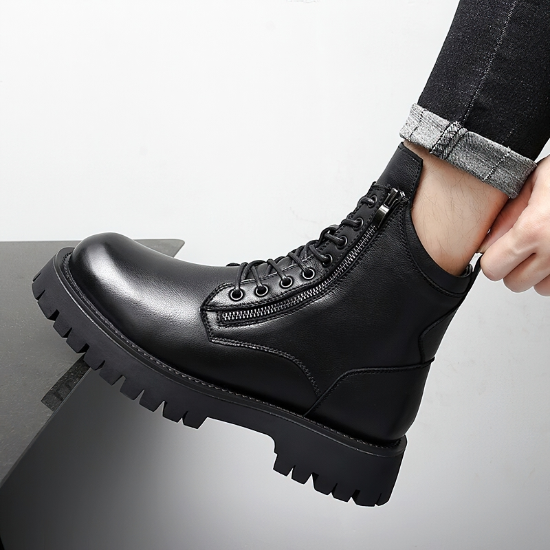 Stylish black leather ankle boots with laces and zip, ideal for rock style casual looks.