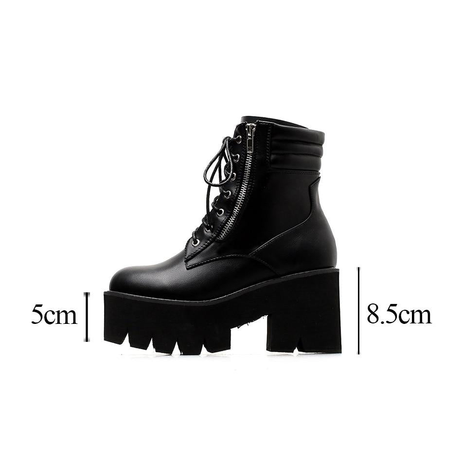Stylish black platform ankle boots for women with lacing and zipper closure, perfect for rocker outfits.