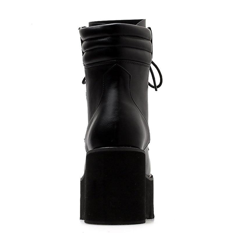Black platform ankle boots for women with a chunky heel and lacing, perfect for rocker outfits and casual wear.