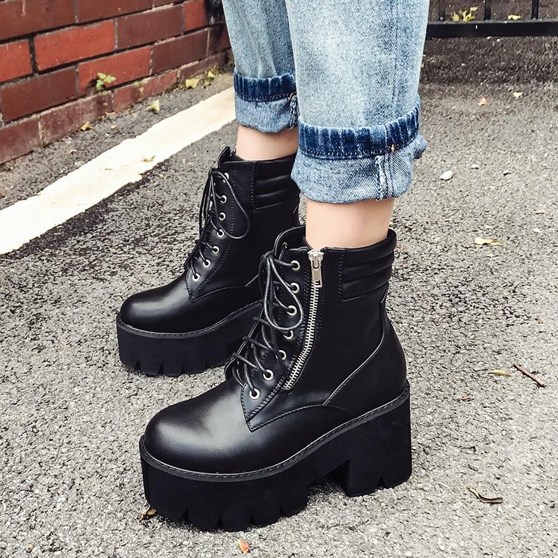 Black platform ankle boots with laces and zipper, perfect for rocker outfits and casual wear.