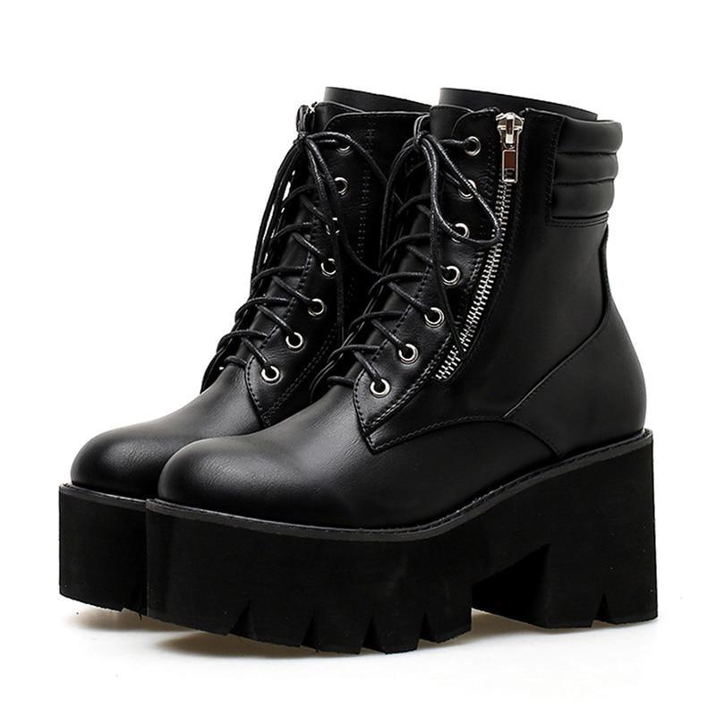 Stylish black platform ankle boots for women with chunky heels, lacing, and zipper closure, perfect for rocker outfits.