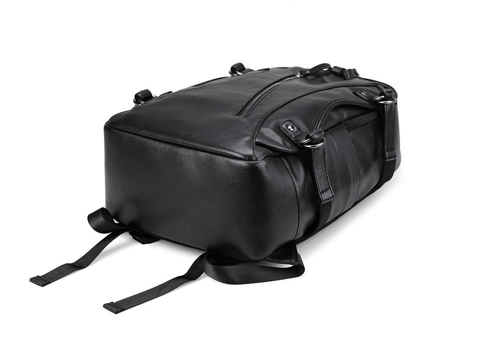Stylish rock-style black backpack with external USB charger, made of imitation leather and polyester.