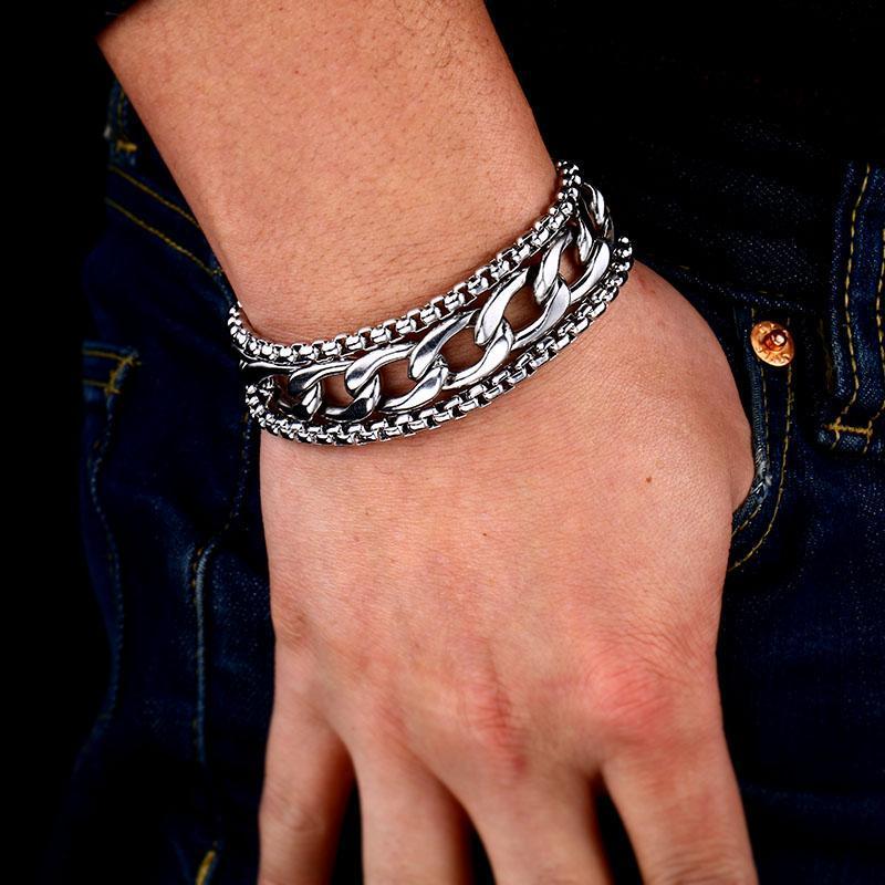 Stylish rock chain wide bracelet on wrist, made of stainless steel, showcasing trendy accessories with a cool mix of chains.