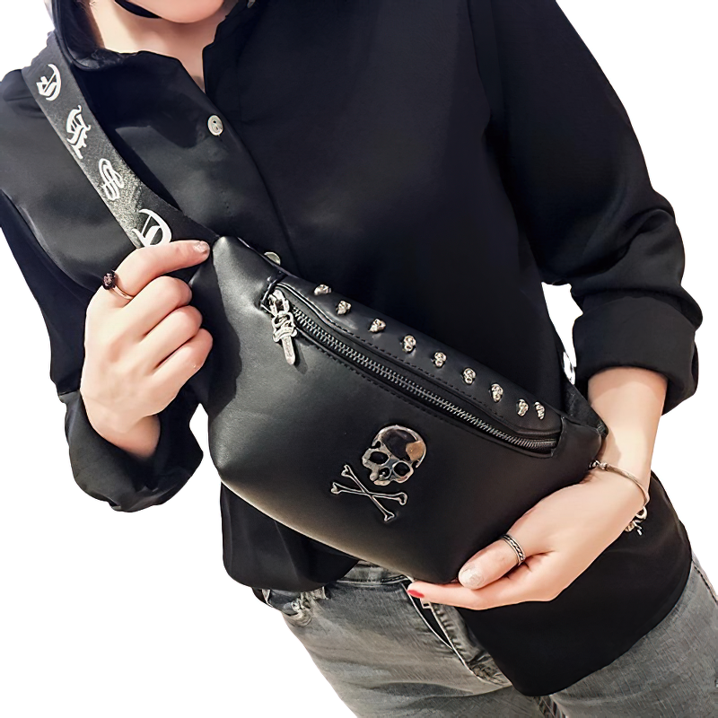 Trendy black unisex crossbody bag with skull and rivets, perfect rock accessory for men and women.