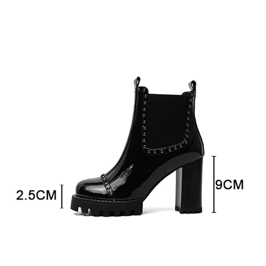Rock style black leather ankle boots with round toe, rivets, and high heels, perfect for edgy fashion.