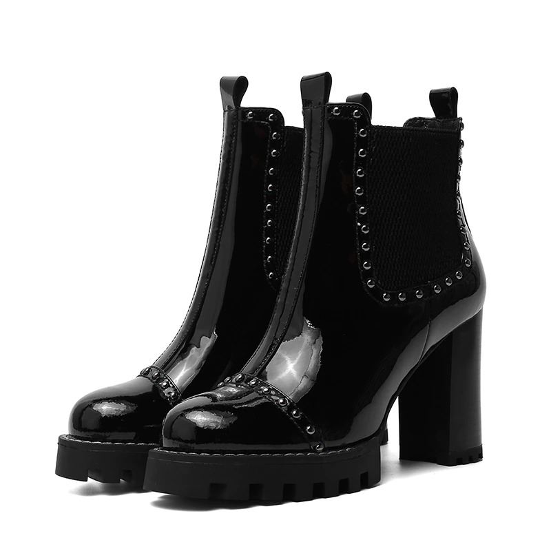 Rock style genuine leather ankle boots with round toe, rivet detailing, and high heels for modern women.