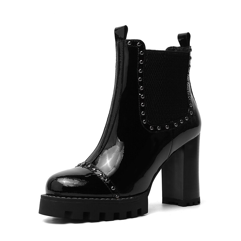 Rock style black genuine leather ankle boots with round toe, rivets, and elegant high heels.