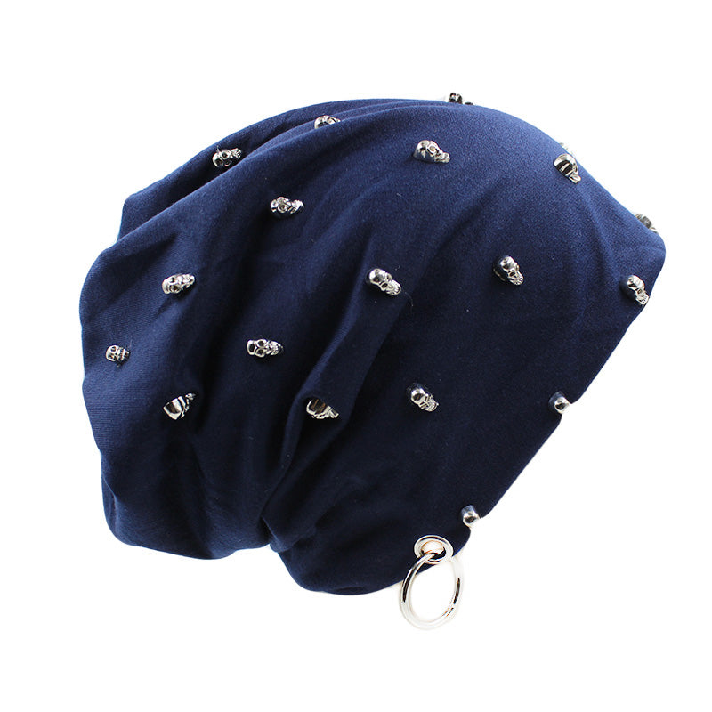 Gothic knitted rave hat in navy blue with skulls and hoop, perfect for punk clothing enthusiasts.