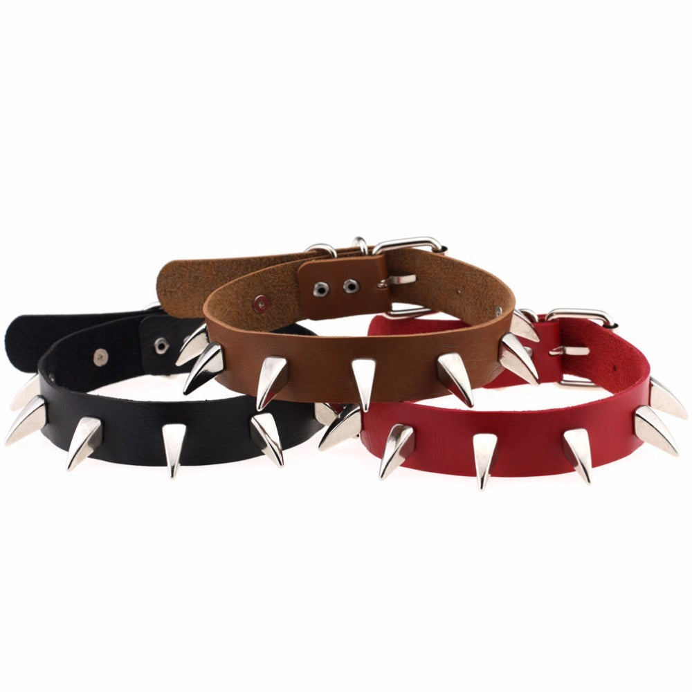 Rock style leather choker necklaces in black, brown, and red with silver spikes for men and women.