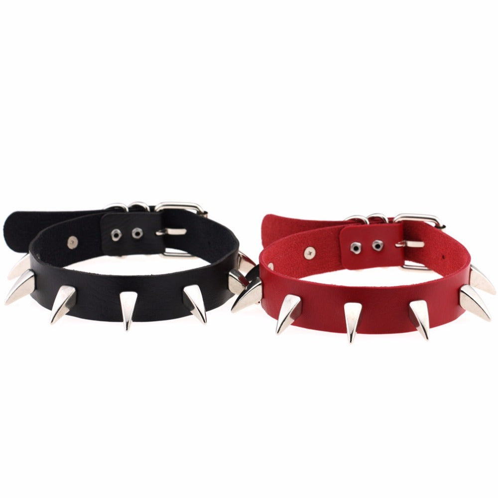 Rock style spiked leather choker necklaces in black and red, perfect for a gothic or biker look.
