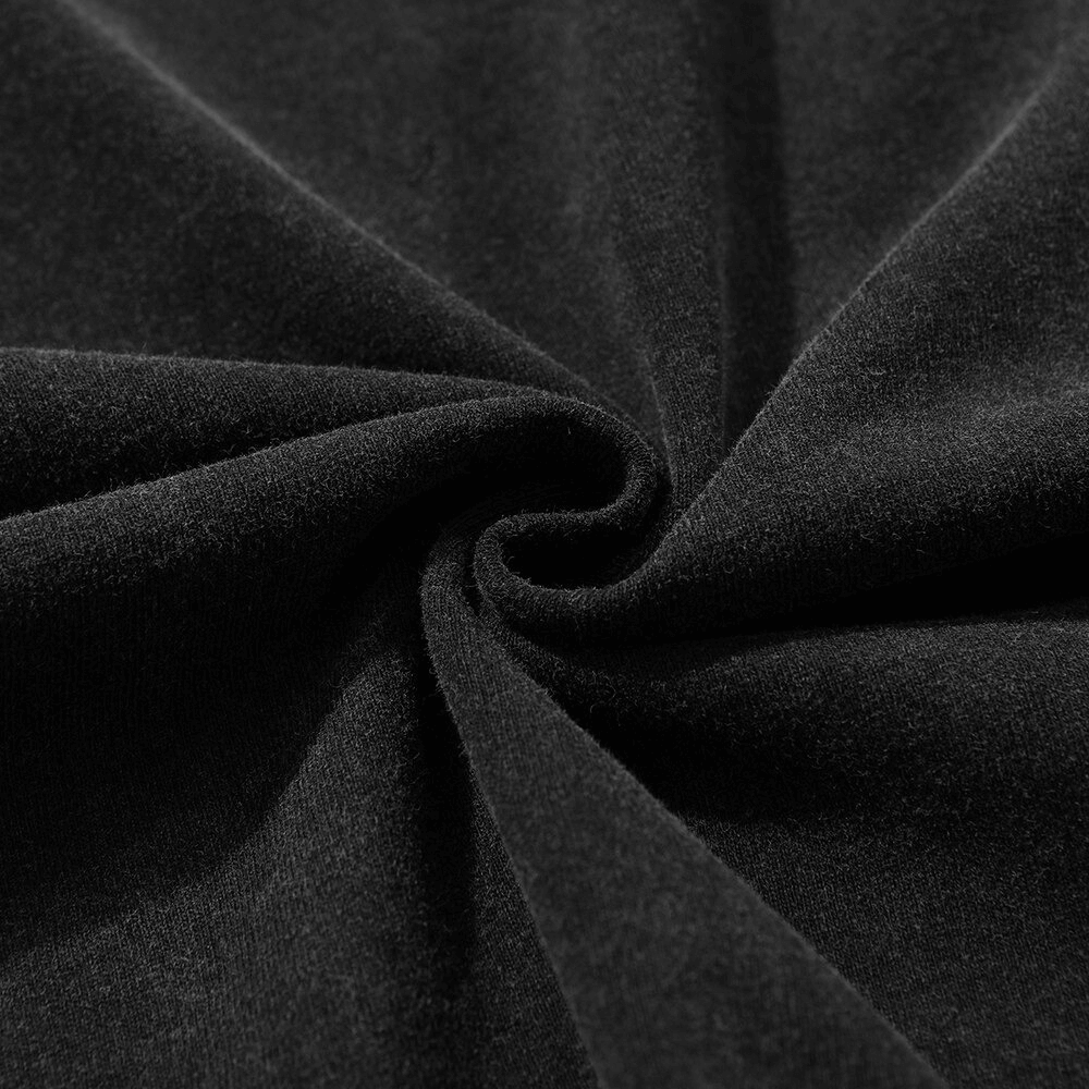 Close-up of soft black fabric, showcasing the texture perfect for a stylish oversized t-shirt.