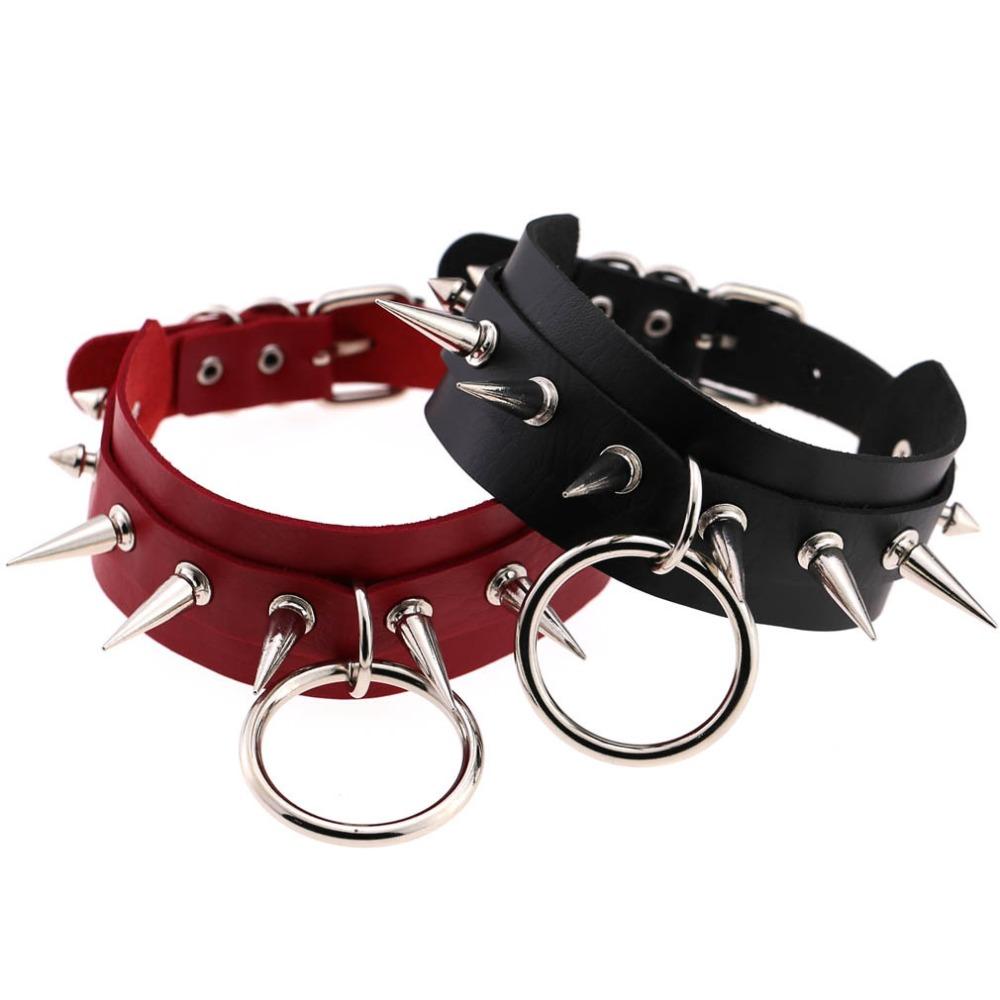 Rock style leather chokers in black and red with spike rivets and metal rings for bold fashion statements.