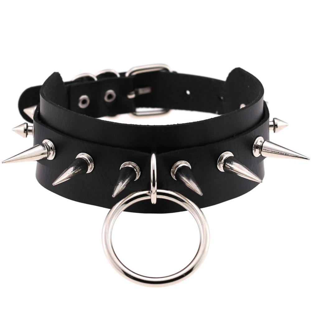 Black leather choker with spike rivets and a central ring for rock style lovers, adjustable length.