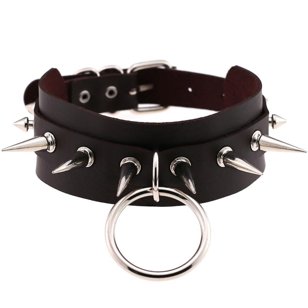 Black leather rock choker with silver spike rivets and ring, unisex accessory in edgy style.