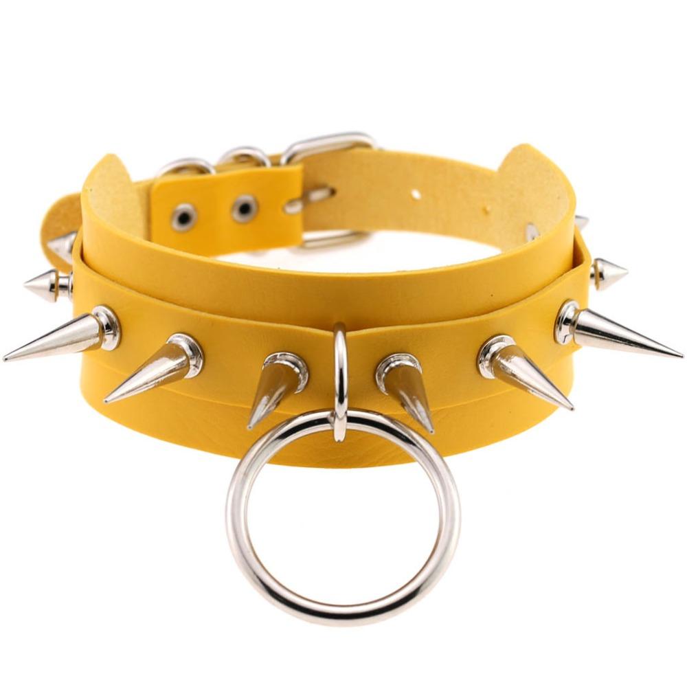 Yellow leather choker with silver spike rivets and ring, perfect for a bold rock style accessory.