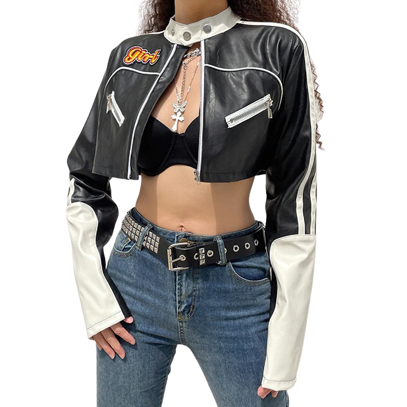 Stylish woman wearing a cropped black and white PU leather patchwork jacket with bold 'Girl' embroidery.