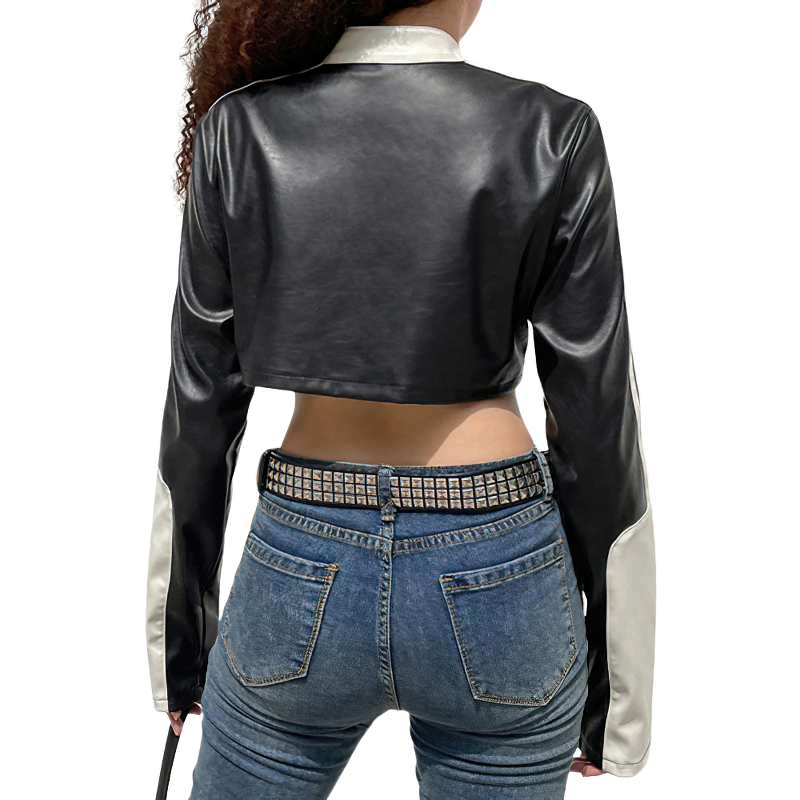 Back view of women's cropped PU leather patchwork jacket in black and white, perfect for alternative fashion and streetwear.