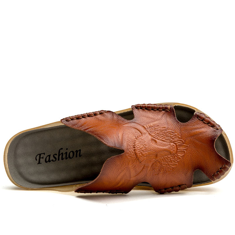 Rock style leather slippers for men with unique design, offering comfort and non-slip features for alternative fashion.