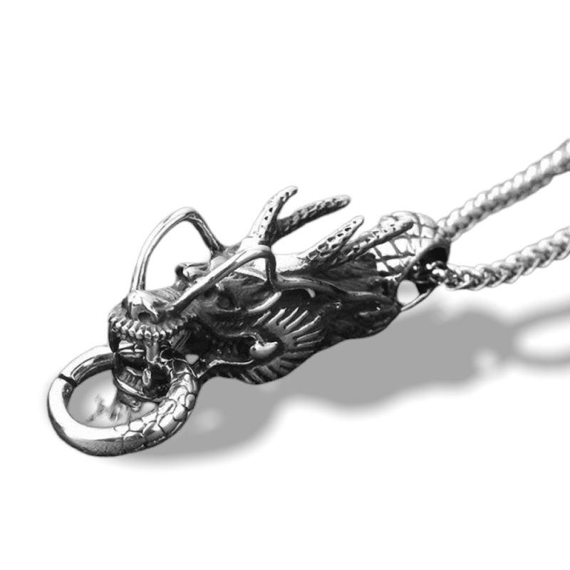 Stainless steel dragon pendant necklace showcasing intricate detailing and bold design, perfect for cosplay or festivals.