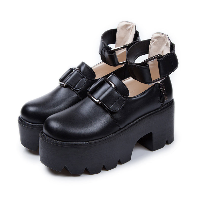 Stylish women's black chunky pumps with round toes and buckled straps, perfect for gothic fashion outfits.