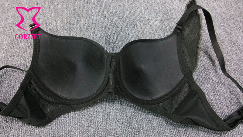 Black punk push-up bra with wing, studs, and rivets, perfect for edgy rock outfits.