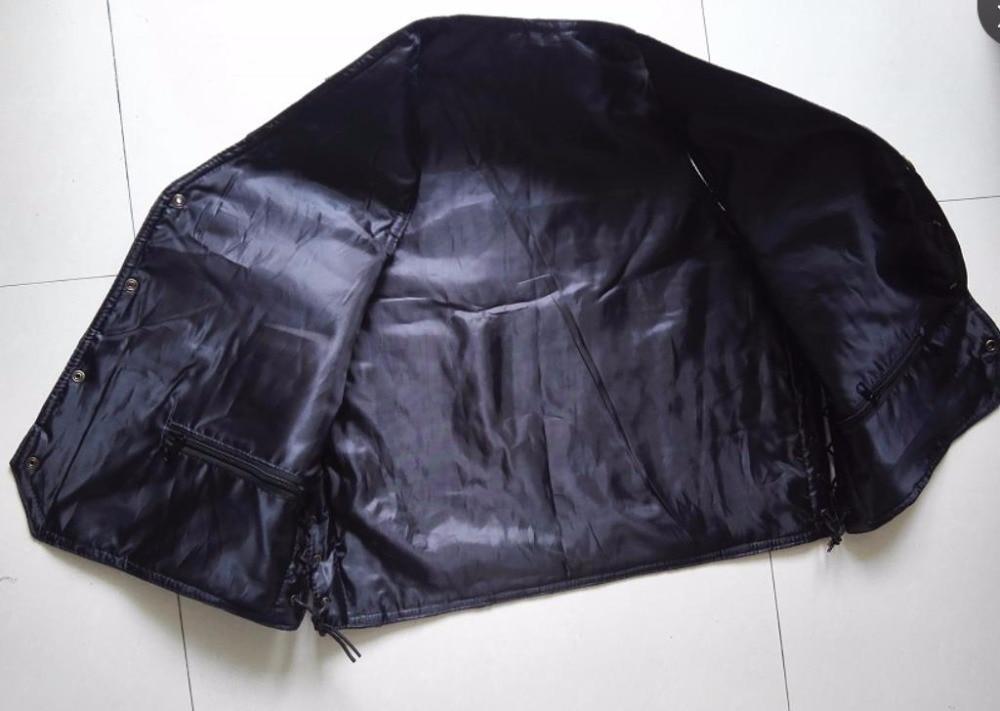 Inside view of a men's genuine leather biker vest, showcasing a sleek black interior design for stylish rock apparel.