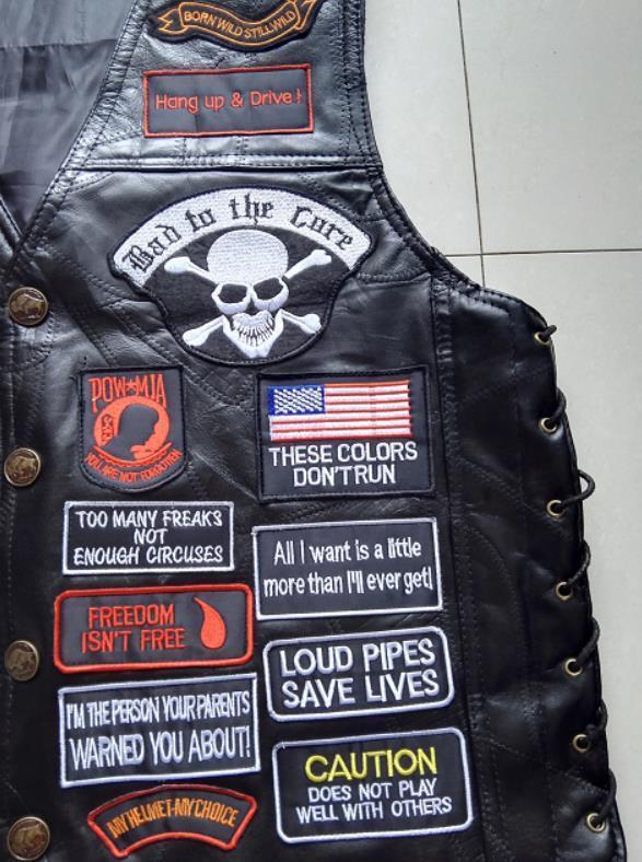 Genuine leather biker vest adorned with edgy rock-style patches and skull design, perfect for unique rock outfits.