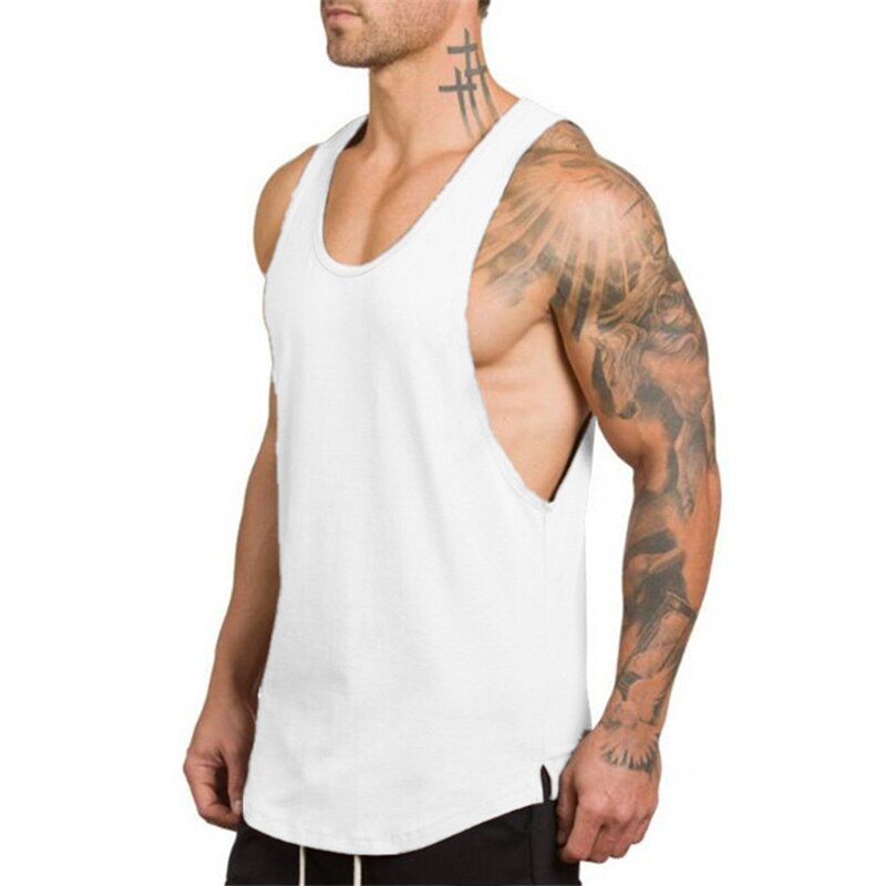 Men's white sleeveless tank top showcasing gothic style and tattooed model, perfect for fitness and alternative fashion.