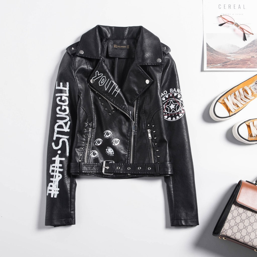 Stylish women's faux leather motorcycle jacket with rock-inspired designs and edgy graphic prints.