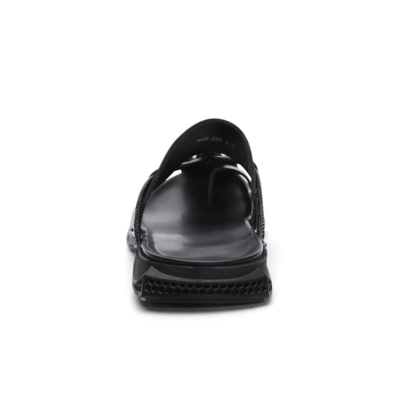 Stylish black Rock'n'Roll style men sandals, genuine leather flip flops, perfect for the beach or casual outings.