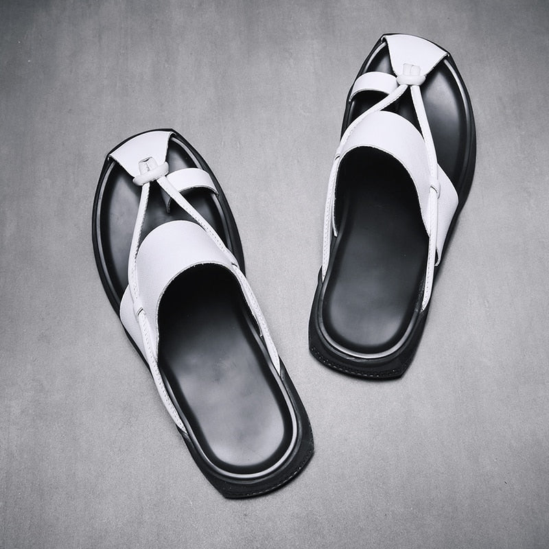 Stylish Rock'n'Roll style men's sandals in black and white, perfect for beach days and casual wear.