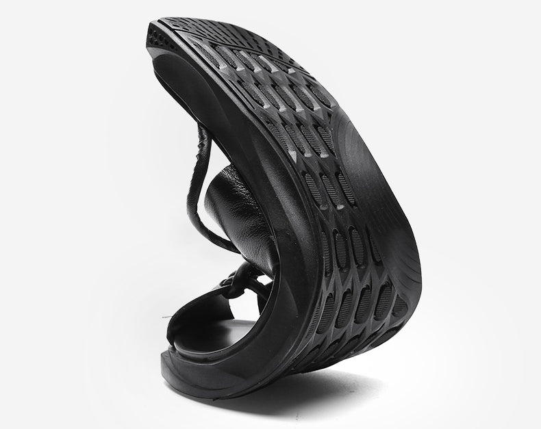 Rock'n'Roll style men sandals in black, highlighting comfort and slip-on design with a stylish and cool rubber sole.