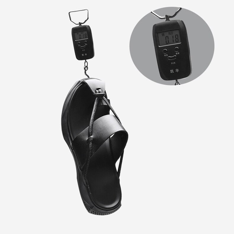Rock'n'Roll style men's genuine leather sandals being weighed on a digital scale, showcasing their lightweight comfort.