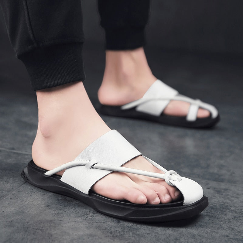 Stylish rock'n'roll men sandals in white leather, designed for comfort and casual beach wear.