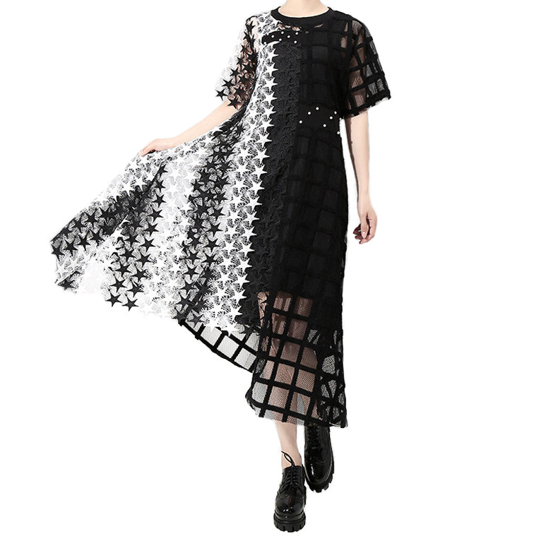 Flowy black and white irregular loose gothic dress with star patterns, perfect for spring outings and parties.
