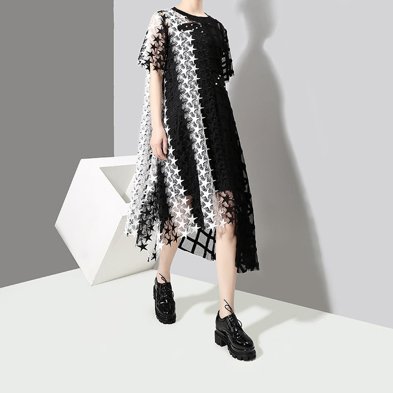 Gothic loose dress featuring black and white patterns, perfect for spring outings or parties, styled with trendy shoes.