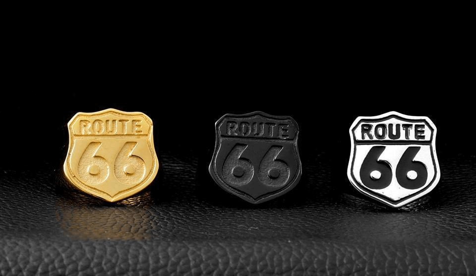 Route 66 shield pins in gold, black, and silver for vintage biker style accessories.