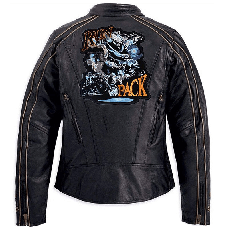 Run with Wolves iron-on patch on a stylish black leather biker jacket, featuring intricate embroidery and a bold design.